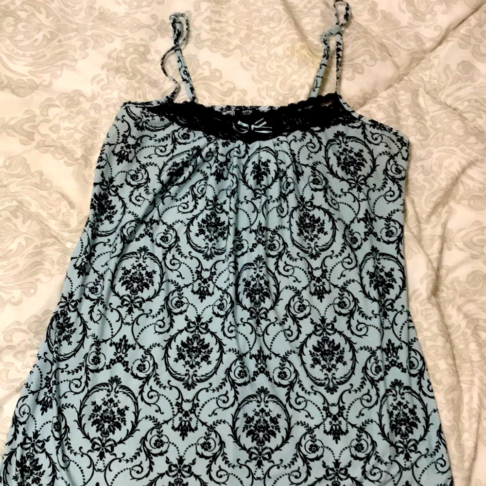 Small size tank top. Color blue. Sleeping tank top